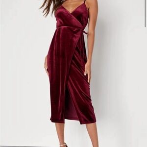 Burgundy velvet dress. NEVER WORN. Size medium. Beautiful dress